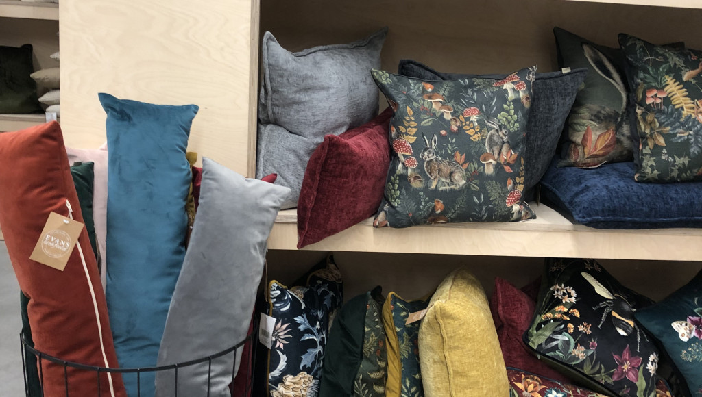 shelves full of cushions from RIVA home