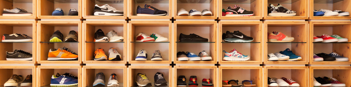 Sports and Leisure footwear displayed in wooden square boxes